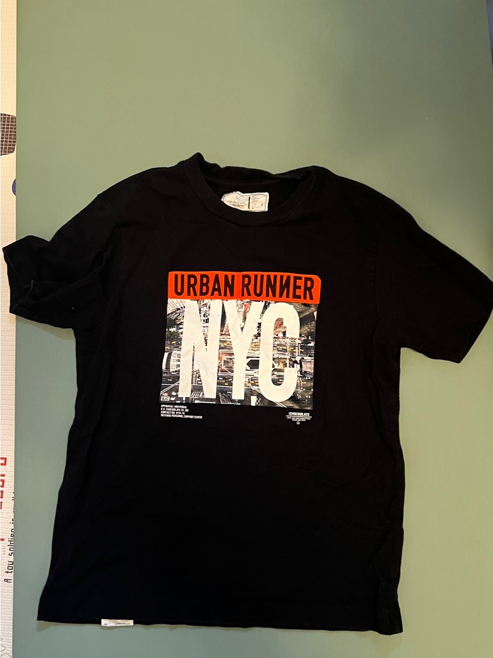 Uniqlo Black Graphic 'NYC' Tee with Orange Accent